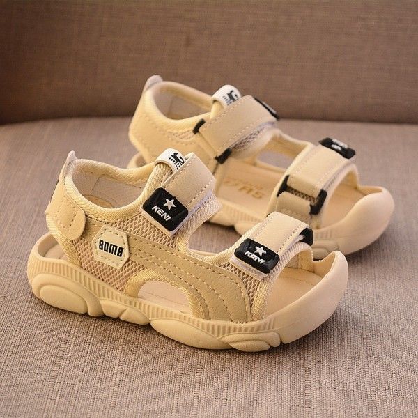 A new generation of 2020 summer children's shoes boy's soft bottom beach shoes boy's Baotou kickproof sandals
