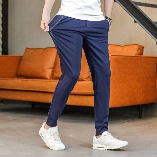 Casual pants spring and summer students boys' sports pants elastic fit trend straight tube small feet all kinds of casual pants
