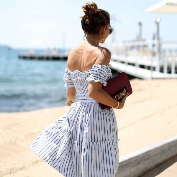 One line collar wood ear dress Europe and America 2020 summer blue and white stripe short sleeve sexy holiday skirt with missing back middle skirt
