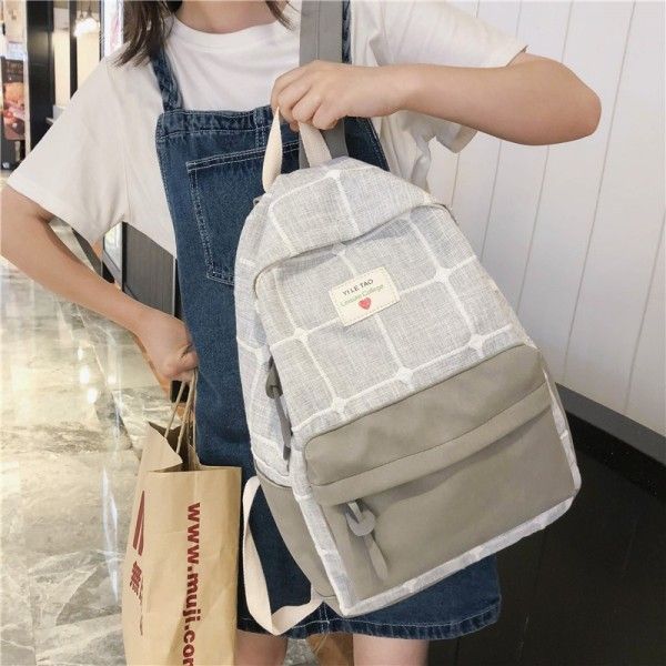 Cross border new ins schoolbag for female students shoulder bag Korean version of Sen Department ancient sense Plaid backpack Japanese canvas bag