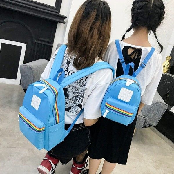 Factory direct sales cross border new leisure backpack children's backpack parent-child nylon solid color schoolbag