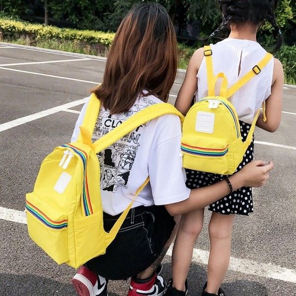 Factory direct sales cross border new leisure backpack children's backpack parent-child nylon solid color schoolbag
