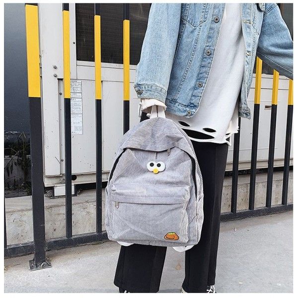 2020 new Korean corduroy student bag 6-12-year-old primary school children's bag men's and women's junior high school double wholesale