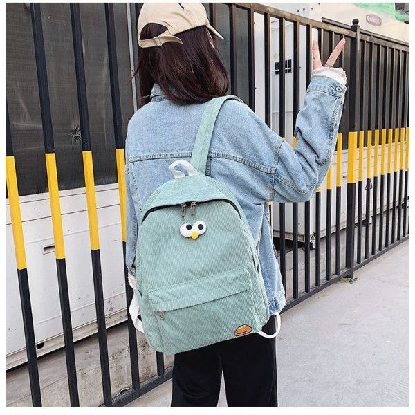 2020 new Korean corduroy student bag 6-12-year-old primary school children's bag men's and women's junior high school double wholesale