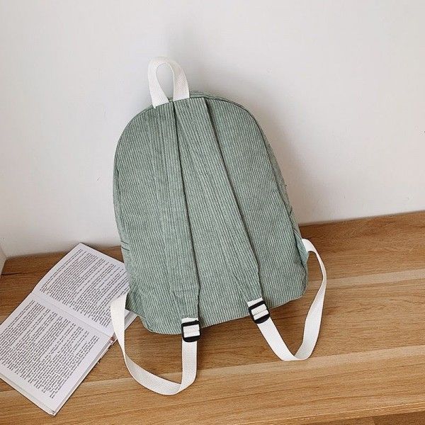 2020 new Korean corduroy student bag 6-12-year-old primary school children's bag men's and women's junior high school double wholesale