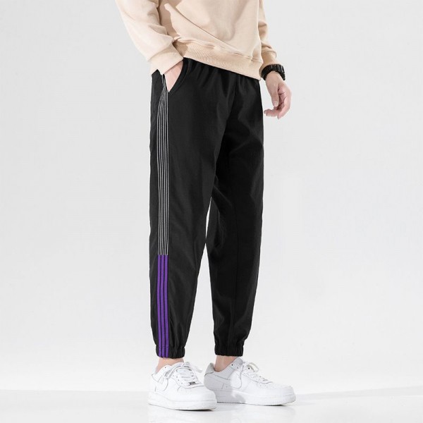 Autumn casual pants men's Korean fashion loose 9-point toe binding fashion brand versatile 3-bar sports pants men's