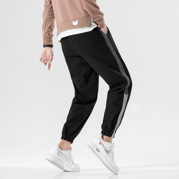 Autumn casual pants men's Korean fashion loose 9-point toe binding fashion brand versatile 3-bar sports pants men's