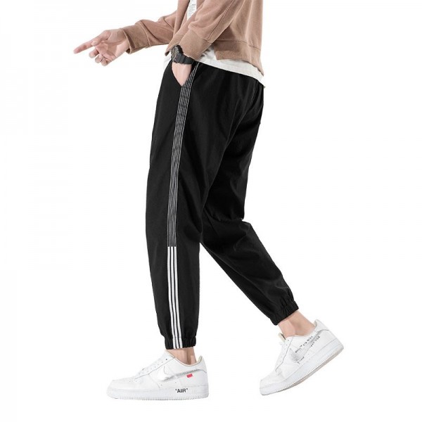 Autumn casual pants men's Korean fashion loose 9-point toe binding fashion brand versatile 3-bar sports pants men's