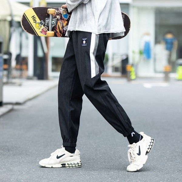 Casual pants men's 2020 spring and Autumn New Korean style fashion versatile men's loose sports Leggings 