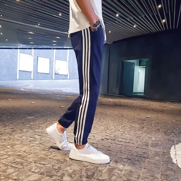 Men's autumn and winter casual pants men's sports pants men's small foot binding hip hop versatile side three bar guard pants 