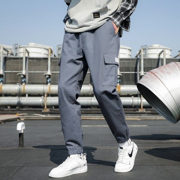 Autumn and winter 2020 new style overalls men's solid color versatile youth loose fashion casual pants men's Japanese tie 