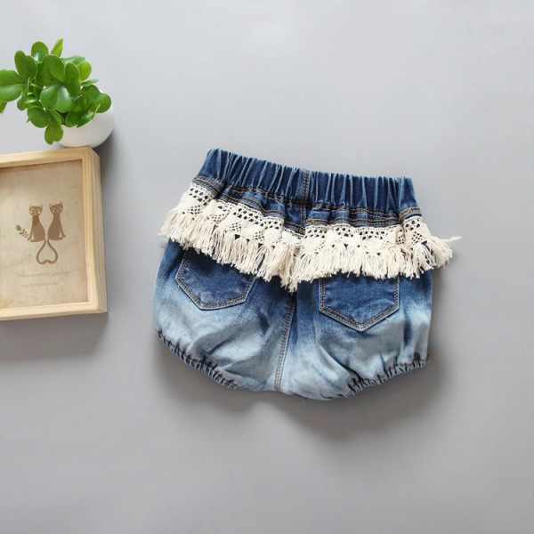 0.6ew generation hair ins new children's clothing European and American girls' new summer holed Jeans Shorts tassel hot pants K15