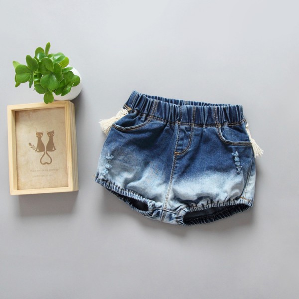 0.6ew generation hair ins new children's clothing European and American girls' new summer holed Jeans Shorts tassel hot pants K15