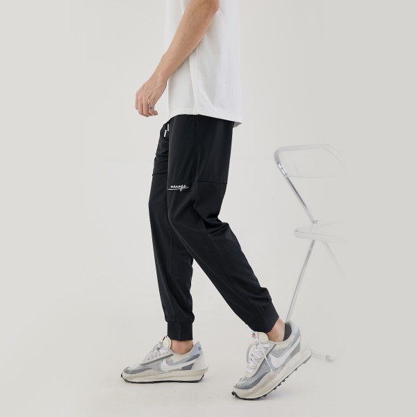 Pre sale men's black cool air conditioning fabric pants men's summer thin fashion pocket embroidery sports casual pants