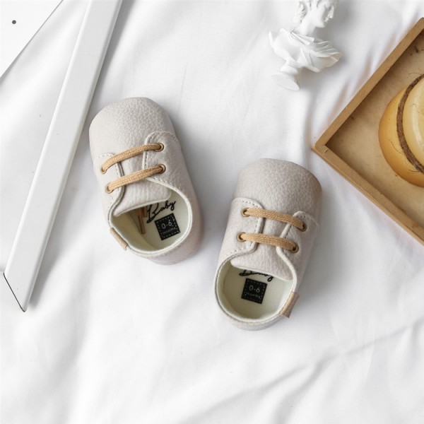 Baby shoes 0-1 year old non slip walking shoes sports leisure sole baby shoes soft film sole spring and autumn small leather shoes 