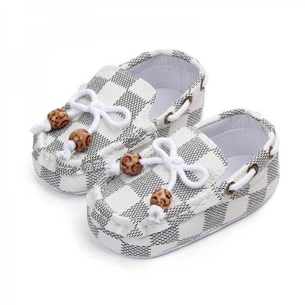 Foreign trade wholesale new classic lattice bean shoes anti slip soft soled baby walking shoes 0-12 months 0945 